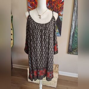 Black and White Patterned Dress with Orange Accents